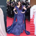 Cannes 2026 में छाईं ऐश्वर्या राय बच्चन, व्हाइट पैंटसूट और फेदर लुक ने लूटी महफिल